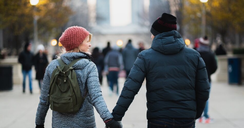 Couple holding hands